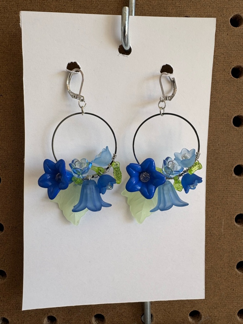 Hand Crafted Blue Floral Hoop Earrings with Green Leaf Accents